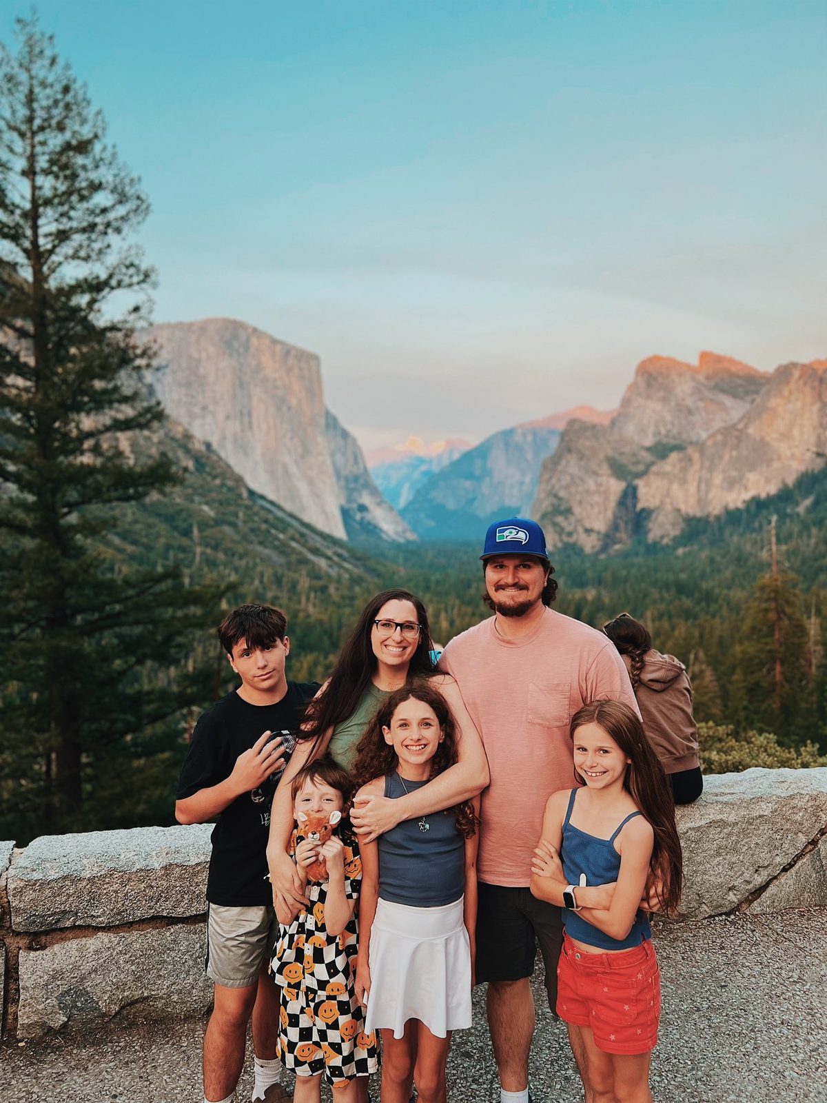 Kierra with her family in the mountains